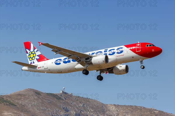 An Edelweiss Airbus A320 aircraft with registration HB-JJL at the airport in Santorini