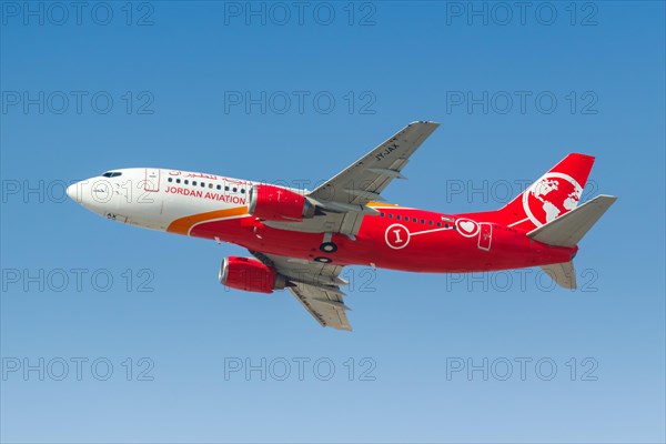 A Jordan Aviation Boeing 737-300 aircraft with registration JY-JAX at Dubai Airport