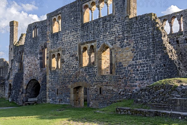 Facade of the Romanesque Muenzenberg Palas with windows and arcades