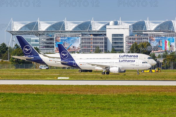Airbus A320 and A350 aircraft of Lufthansa at the airport in Munich
