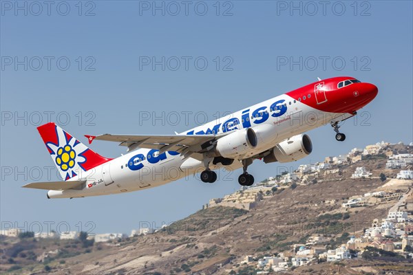 An Edelweiss Airbus A320 aircraft with registration HB-JJL at the airport in Santorini
