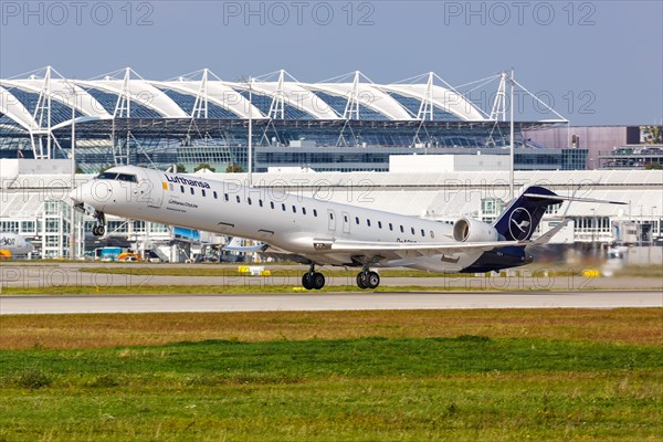 A Bombardier CRJ-900 aircraft of Lufthansa CityLine with the registration D-ACNG at the airport in Munich