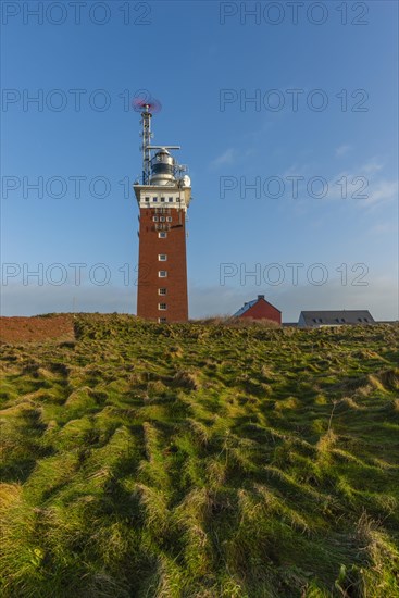 Brick lighthouse with radar antenna