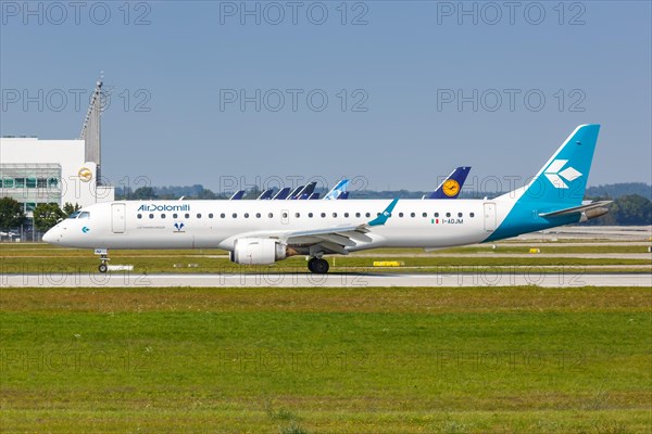 An Air Dolomiti Embraer ERJ195 with registration number I-ADJM at Munich Airport