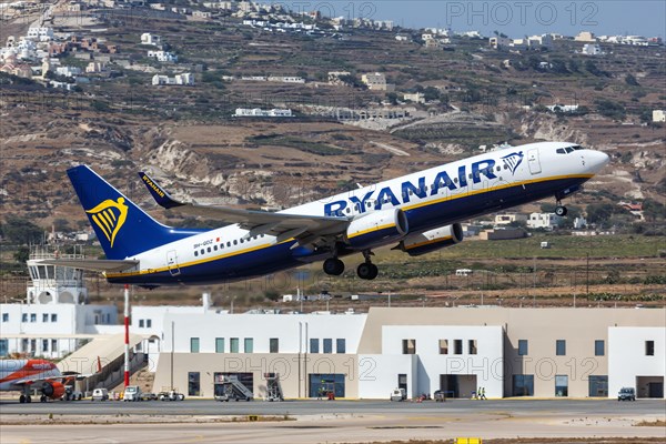 A Ryanair Boeing 737-800 aircraft with registration number 9H-QDZ at Santorini airport