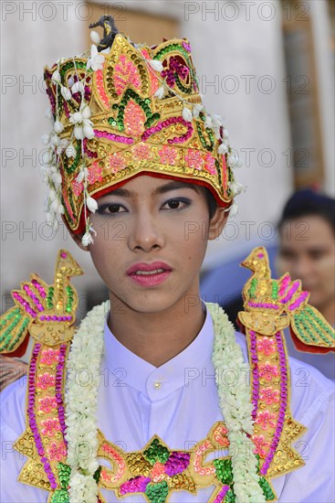 Splendidly dressed aspiring novice at novice ceremony