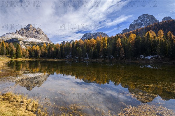 Antorno lake towards Tre Cime di Lavaredo mountain reflected in lake