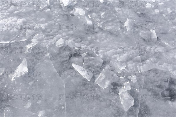 Chunks of ice on a frozen surface