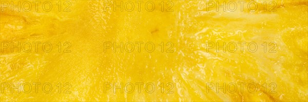 Pineapple fruit background from above panorama