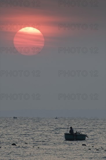 Fishing boats at sunrise