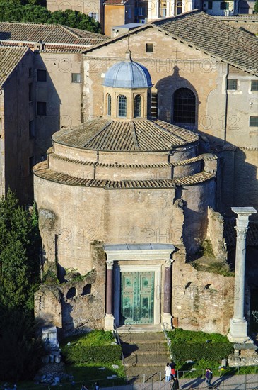 View of historical temple of Romulus with original bronze door from antiquity