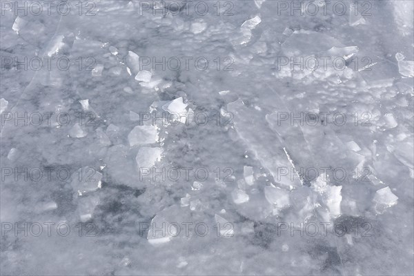 Chunks of ice on a frozen surface