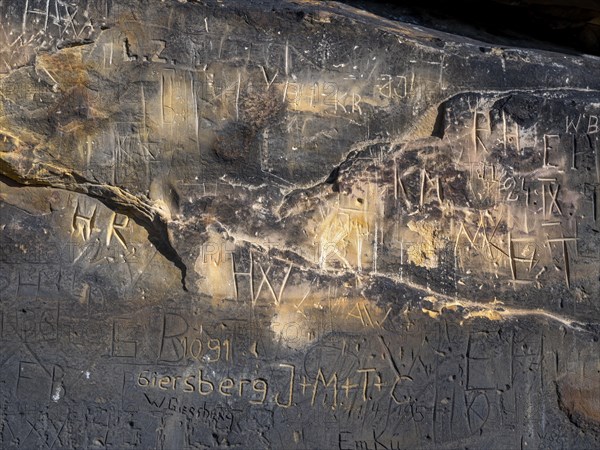 Names carved on stones at the rock formation Koenigstein