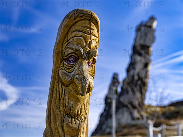 Carved wooden figure at the Devil's Wall rock formation near Weddersleben