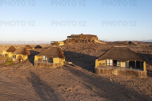 The Doro Nawas Camp and arid desert plains at the edge of the dry river bed of the Aba-Huab river