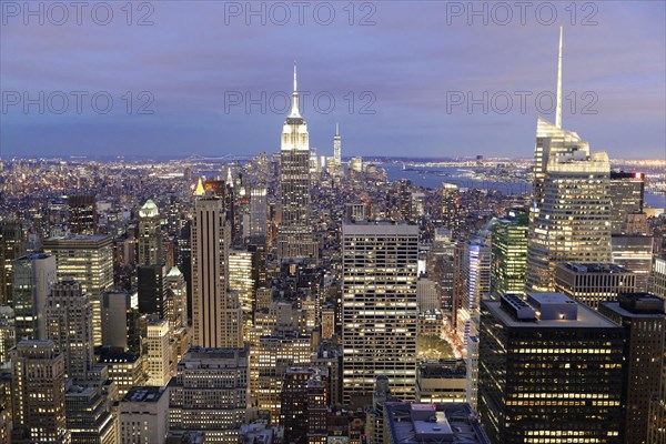 View of Midtown and Downtown Manhattan and Empire State Building from Top of the Rock Observation Center at sunset