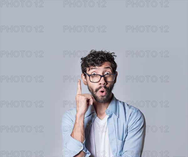 Shocked young man with new idea