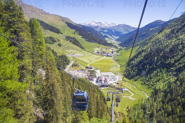 Mountain railway glacier bus above the valley station of the Hintertux glacier