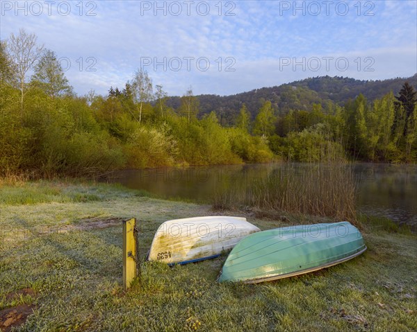 Lake with boats in the morning