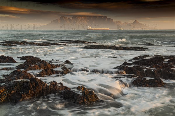 Last light on Table Mountain at sunset seen from Blouberg beach