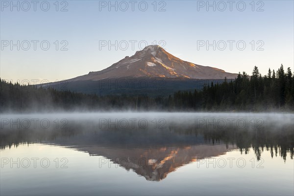 Reflection of Mt Hood volcano in Trillium Lake