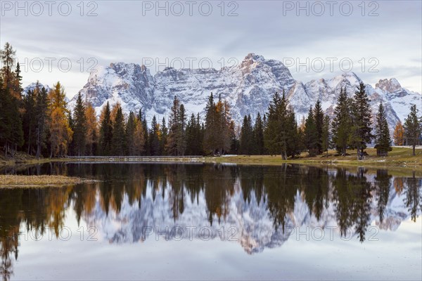 Antorno lake with Sorapis mountain group in the morning reflected in lake