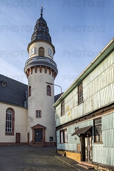 Protestant church with round bell tower with neo-baroque roof