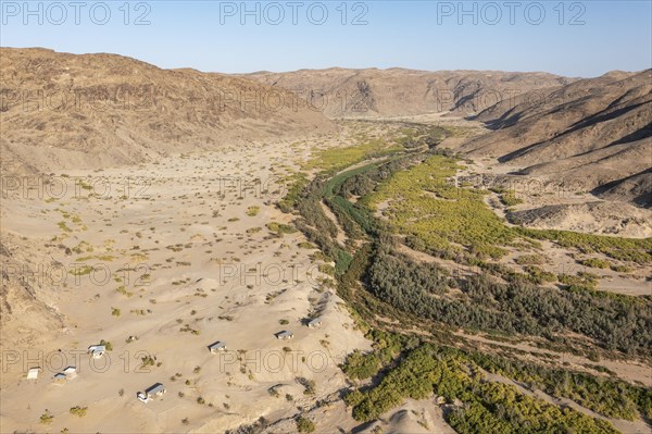 The Elephant Song campsite at the edge of a swampy stretch of the Hoanib river