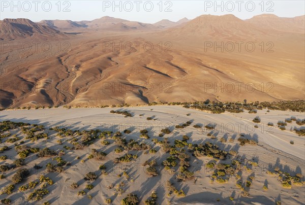 The dry bed of the Hoarusib river and adjoining badlands