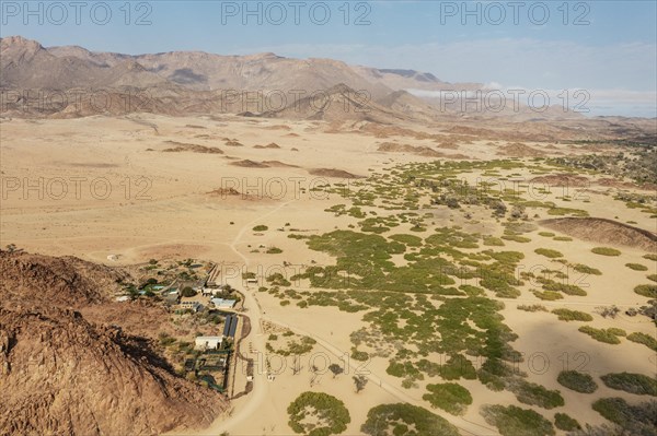 The Brandberg White Lady Lodge at the edge of the dry river bed of the Ugab river