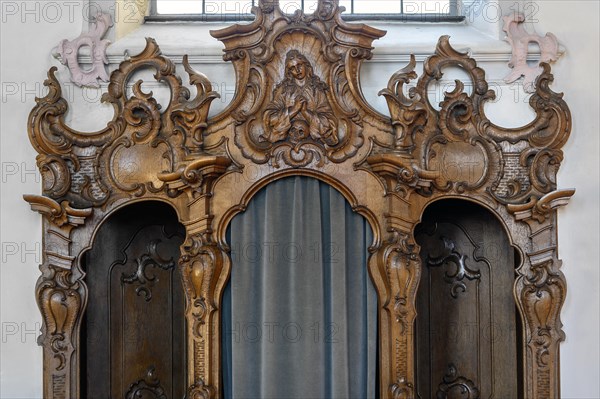 Richly carved confessional