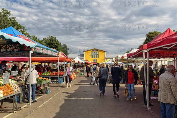 People at a weekly market market