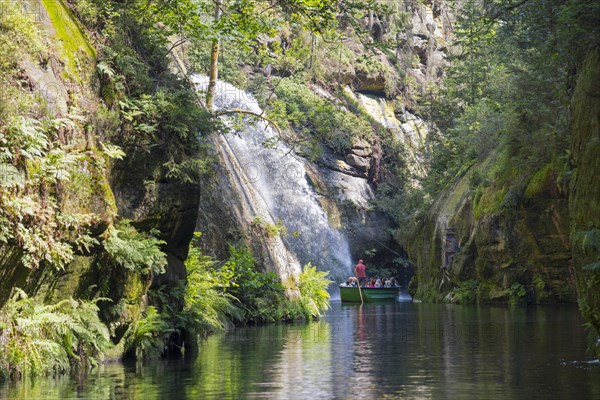 Boat at the waterfall in the Edmundsklamm