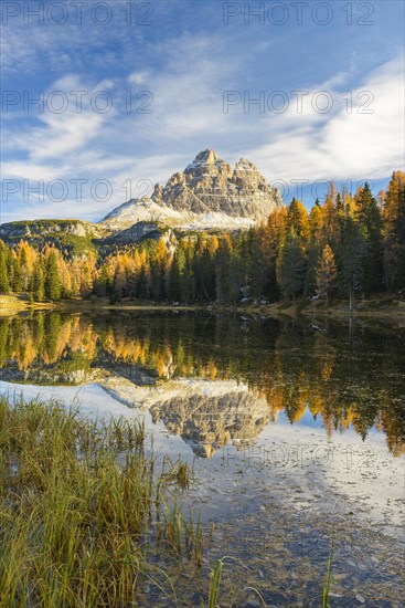 Antorno lake towards Tre Cime di Lavaredo mountain reflected in lake