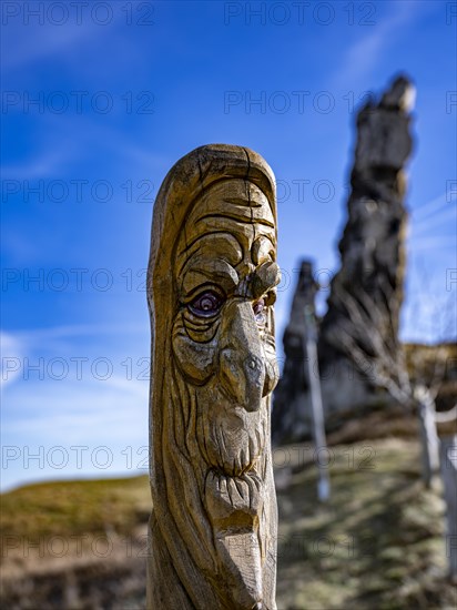 Carved wooden figure at the Devil's Wall rock formation near Weddersleben