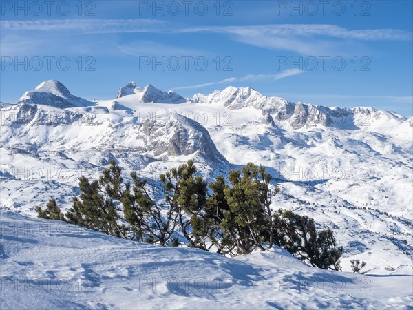 Morning light over winter landscape in the snowy Alps