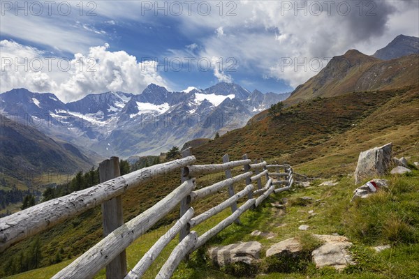 Hiking trail with pasture fence