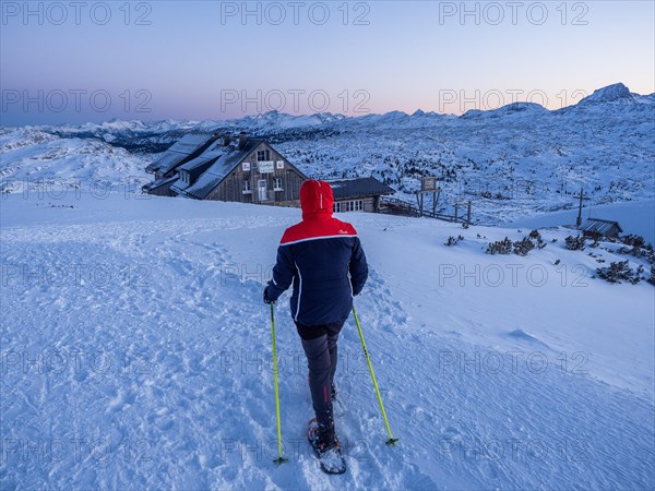 Snowshoe hiker on the way to Krippenstein Lodge