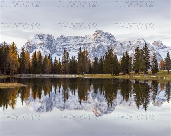 Antorno lake with Sorapis mountain group in the morning reflected in lake