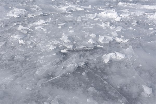 Chunks of ice on a frozen surface