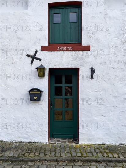 Historic front door from 1130 from the 12th century in the outer bailey of Reifferscheid Castle