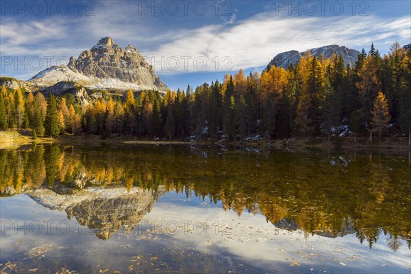 Antorno lake towards Tre Cime di Lavaredo mountain reflected in lake