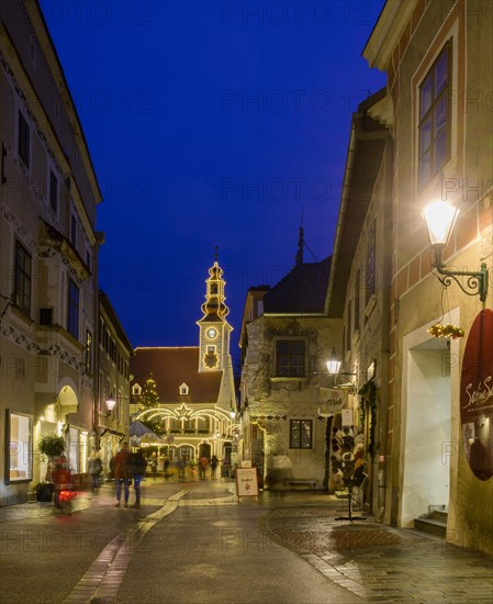 View to the main square with town hall with Christmas lights