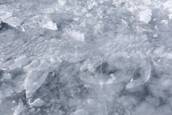 Chunks of ice on a frozen surface