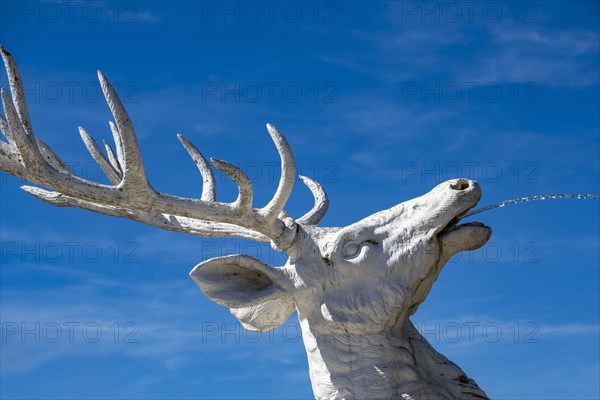 Gargoyle deer figure in the palace garden at Schwetzingen Palace