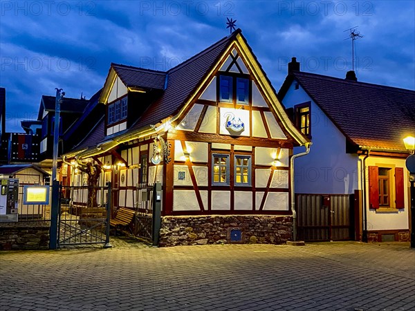 Old half-timbered house at dusk