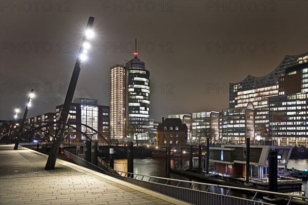 Elbe promenade with Columbus House and the Elbe Philharmonic Hall at night