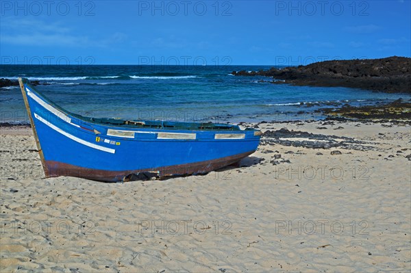 Stranded fishing boat on Caleta del Mojon Blanco beach