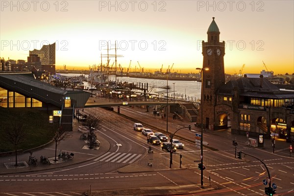 Elbe Philharmonic Hall with clock tower and gauge tower at sunrise