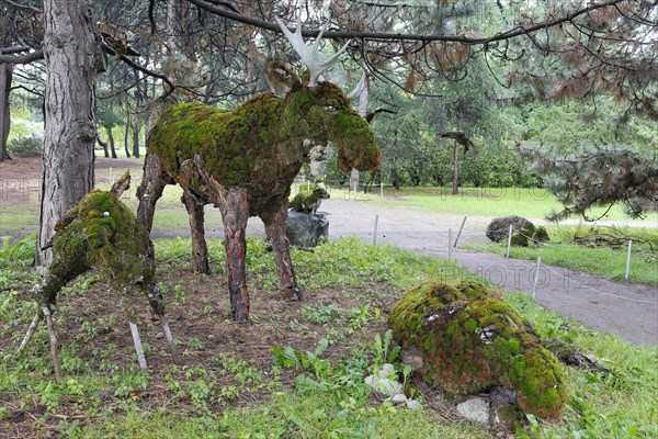 Moose figure sculpture made of wood